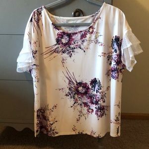 Maurices white blouse with lace sleeves and purple flowers.